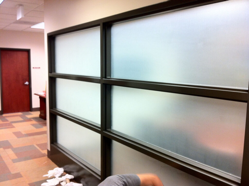 A large office window with security films