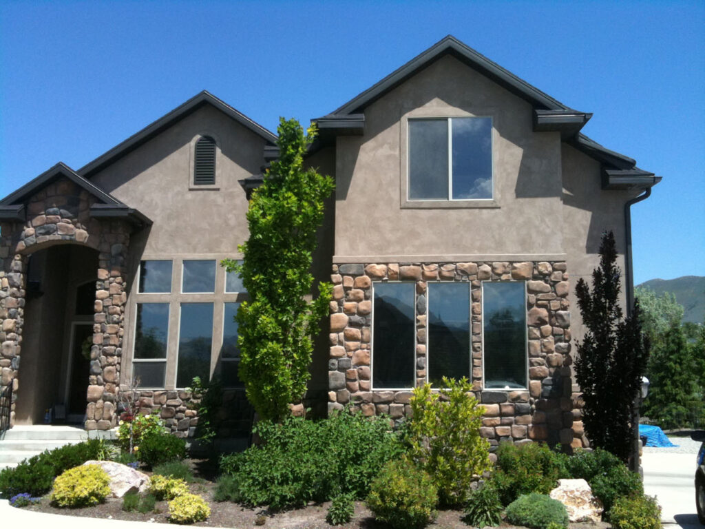 A large house with dark tinted windows