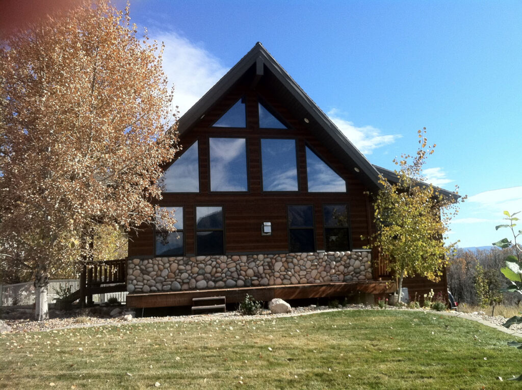 A residential property with a wooden cabin style