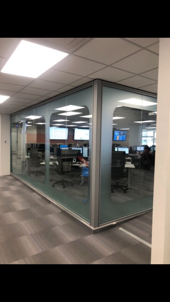 An office with large glass walls